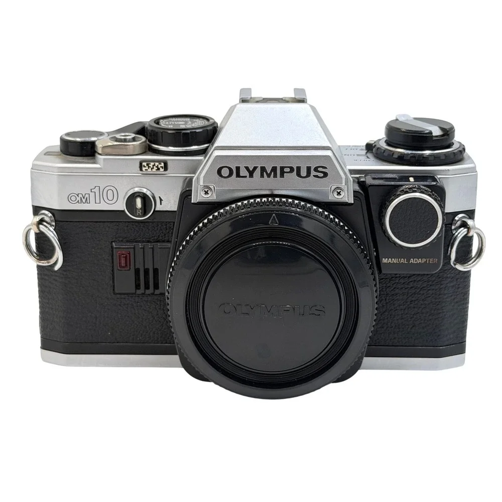 Olympus OM10 35mm Film SLR Camera Body Silver Black with Manual Adapter TESTED